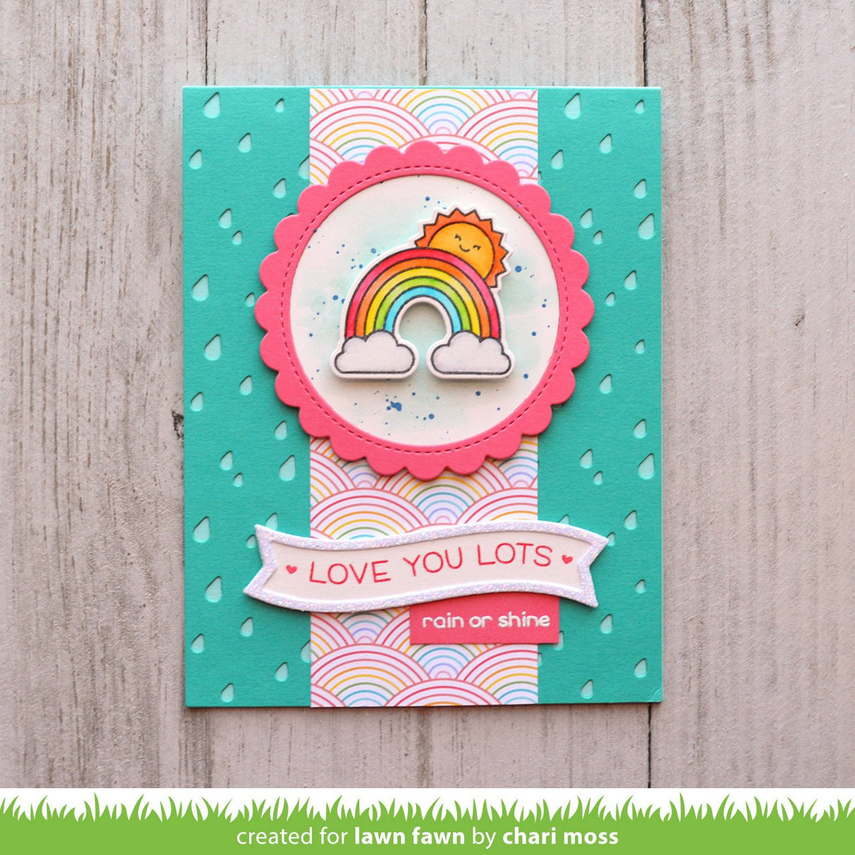 Love you lots rain or shine card with raindrops background and rainbow and sun in the center