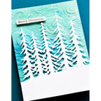 Memory Box Evergreen Tree Stand Die 94969 blue swirl background whites trees card