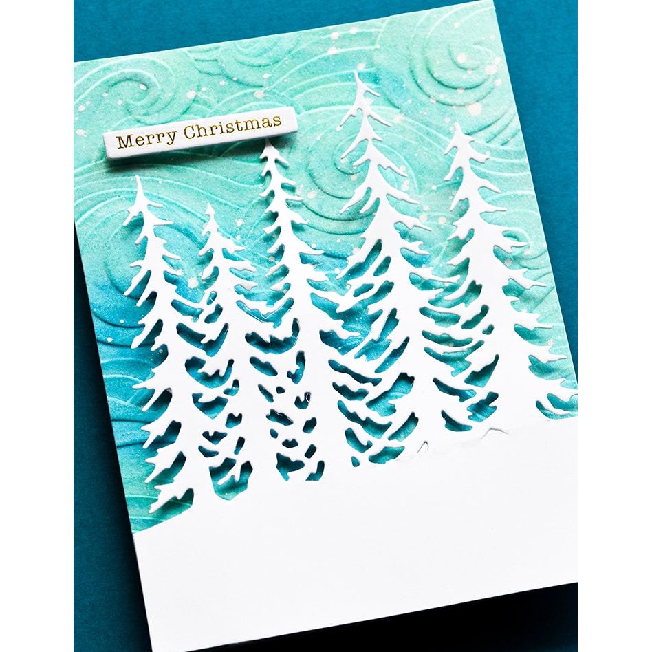 Memory Box Evergreen Tree Stand Die 94969 blue swirl background whites trees card