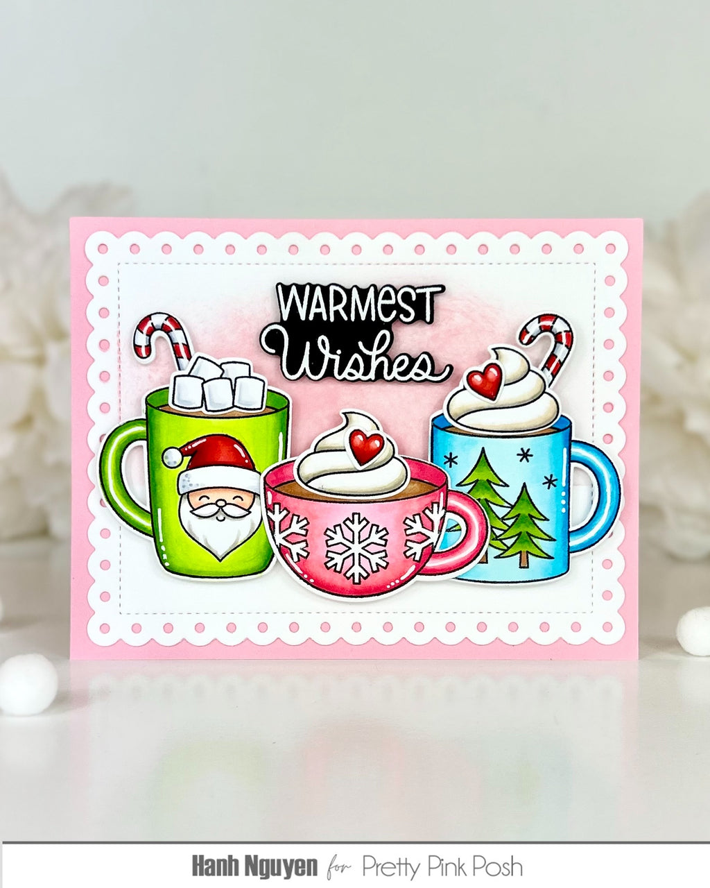 Pretty Pink Posh Warm Heart STAMPtember Exclusive Card from Hanh Nguyen with a pink base and containing the sentiment warmest wishes. Three cups of cocoa are the card in varying colors