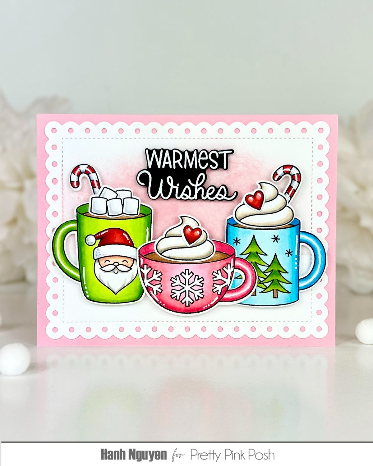 Pretty Pink Posh Warm Heart STAMPtember Exclusive Card from Hanh Nguyen with a pink base and containing the sentiment warmest wishes. Three cups of cocoa are the card in varying colors