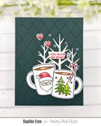 Pretty Pink Posh Warm Heart STAMPtember Exclusive Card from Sophie Ems that has a diamond die cut background. The card has the sentiment you warm my heart with two cups of cocoa beneath it.