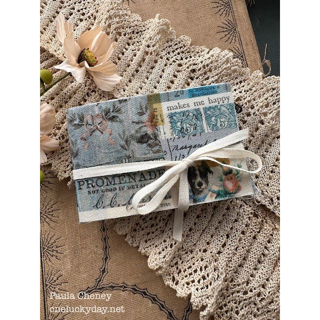 Paula Cheney Palette Blue book tim holtz fabric with bow | color-code:alt2