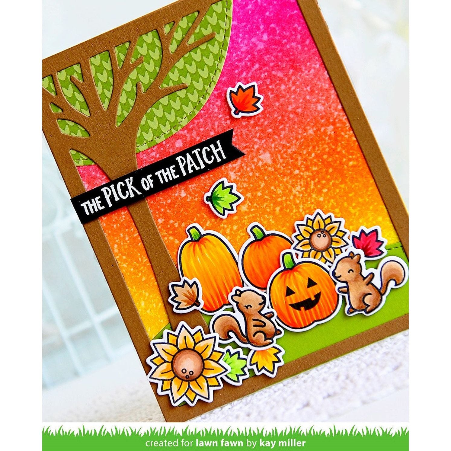 Autumn-themed card with pumpkins, leaves, and a tree design.