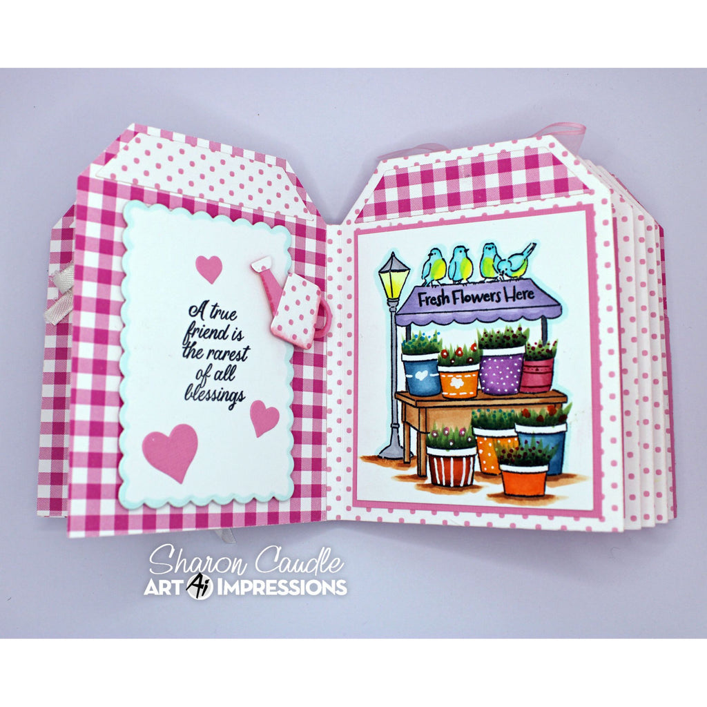 Pink Gingham Garden Book with Sentiment 'A True Friend is the Rarest of All Blessings' with Fresh Flowers Here imagery