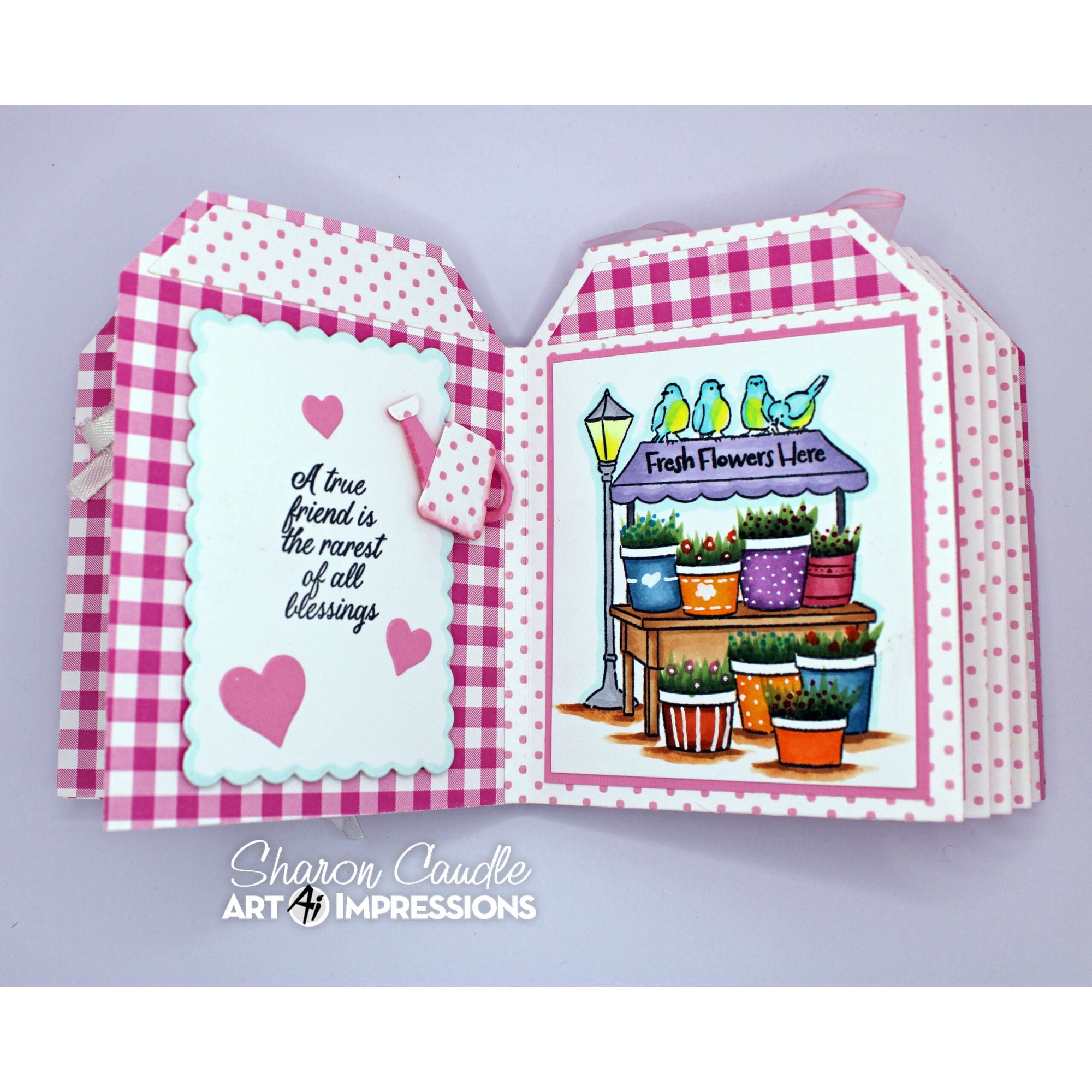 Pink Gingham Garden Book with Sentiment 'A True Friend is the Rarest of All Blessings' with Fresh Flowers Here imagery