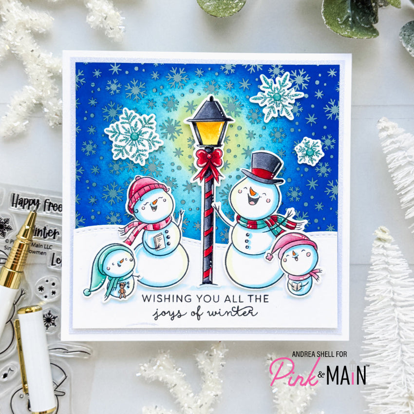 Pink and Main Singing Snowmen Clear Stamp and Die Set snowflakes background card
