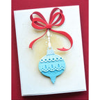 Poppy Stamps Nordic Drop Ornament Dies 2808 red bow ribbon wood grain background card