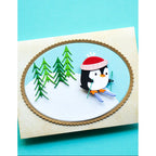 Poppy Stamps Nordic Noel Penguin Bundle skis green trees snow hill card
