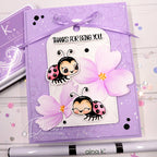 Purple Greeting card with ladybug design and 'Thanks for being you' text, featuring Gina K. Design Studio branding.