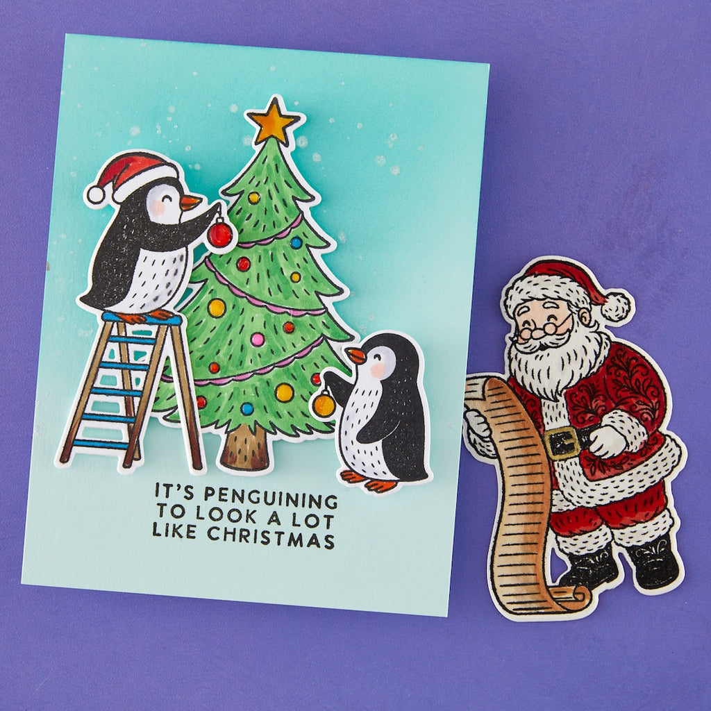 Ranger Simon Hurley Polar Friends Clear Stamps hur93909 It's Penguining to look a lot like Christmas card with penguins decorating a holiday tree and Santa checking his list as an extra piece
