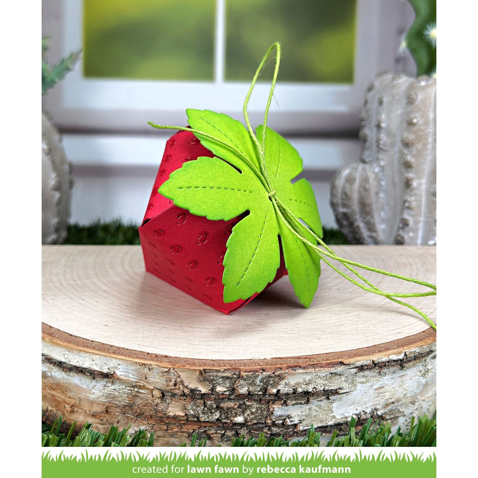 Red strawberry-shaped treat box assembled