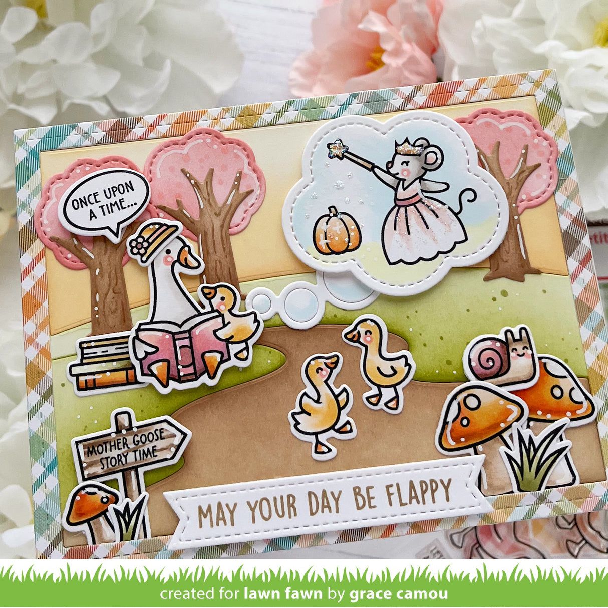 Handmade card with cartoon characters and scenic elements, featuring a fairy tale theme.