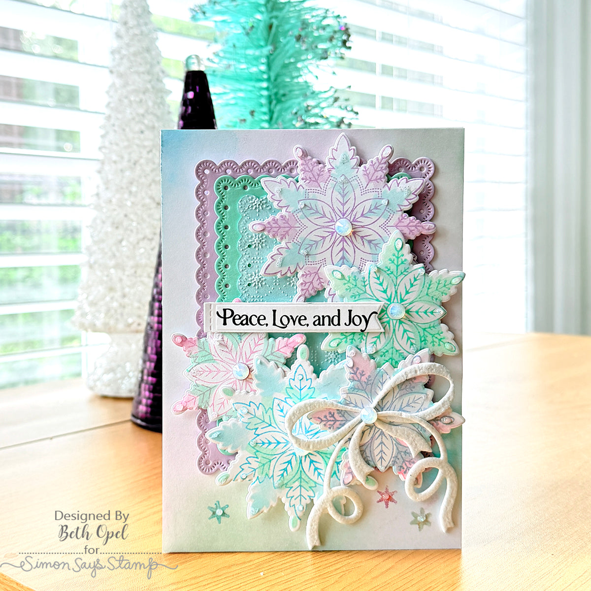 Simon Says Stamp Gina K Designs Christmas Star Flakes in July Stamps Dies Stencils Embossing Folder and Ink Beth Opel Purple and Green Holiday Snowflakes Card | color-code:ALT10