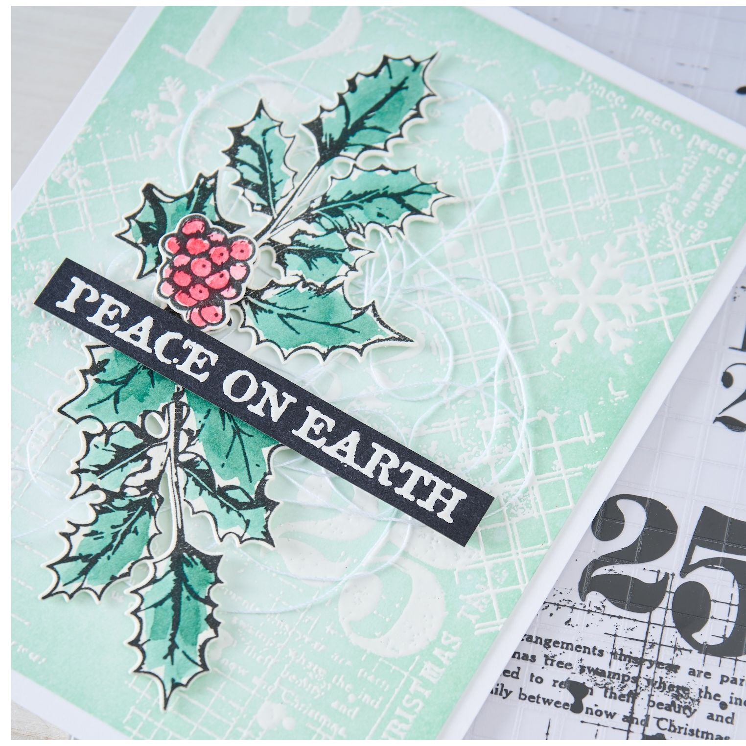 Sizzix and 49 and Market Holiday Textures Clear Stamps Set 667181 garland with berries peace on earth card