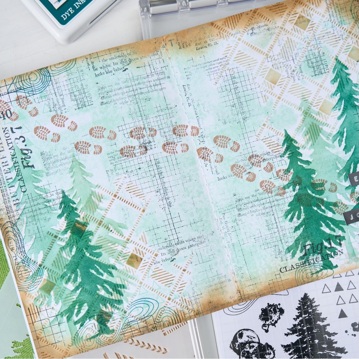Sizzix and 49 and Market Outdoor Essentials Clear Stamps and Stencils 667185 foot prints in snow trees card