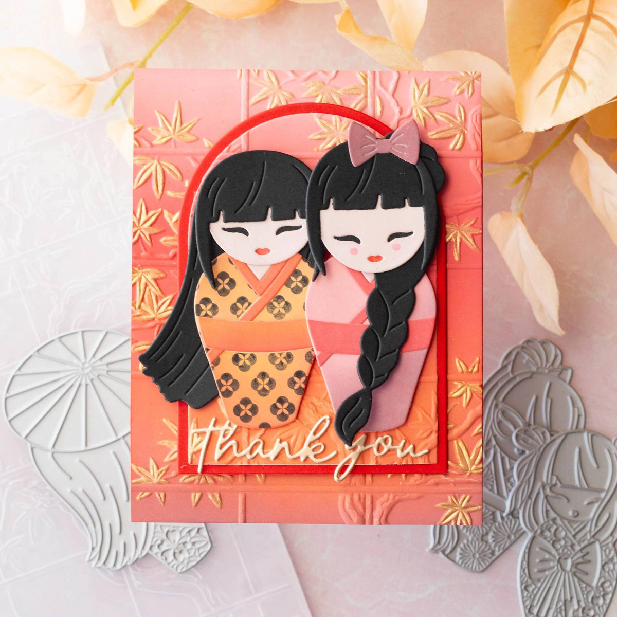 Spellbinders Autumn Kokeshi Dolls Stamp and Die Set sds-239 pink hair bow long black hair gold leaves thank you card marie heiderscheit