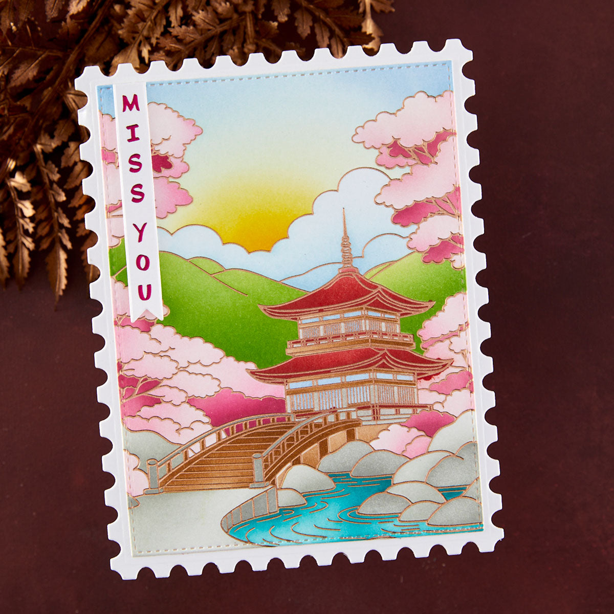 Spellbinders Autumn in Kyoto Press and Foil and Stencil Set bd-1126 pink trees bridge red house miss you card