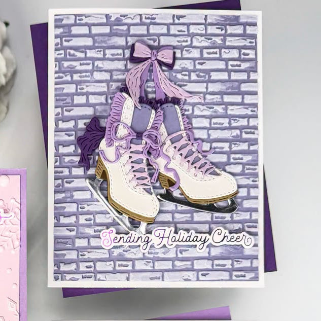 Spellbinders Frosty Skates Etched Dies s4-1566 purple bow purple laces brick background holiday cheer card