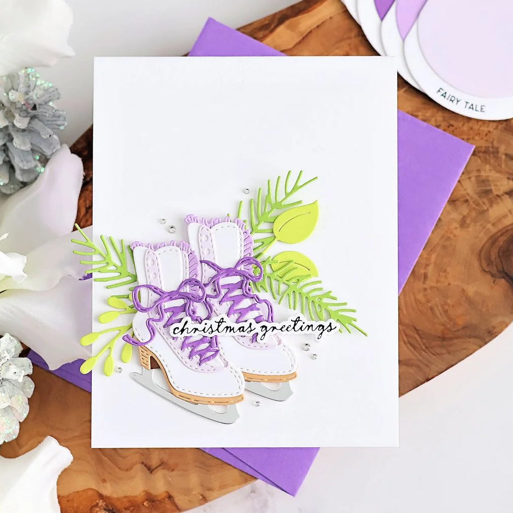 Spellbinders Frosty Skates Etched Dies s4-1566 purple laces clear gems green leaves and stems christmas greetings card