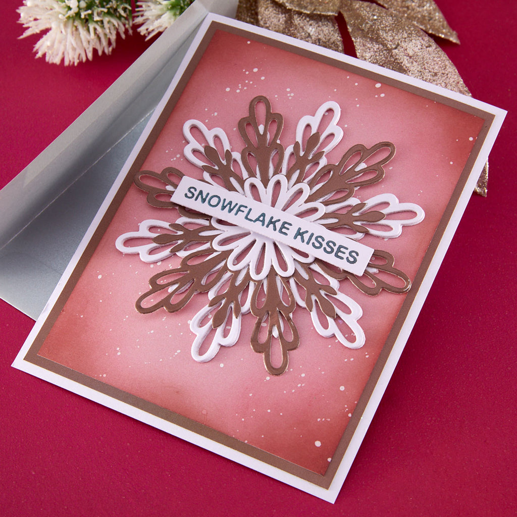 Spellbinders Layered Snowflakes Etched Dies s5-762 red background snowflake kisses card
