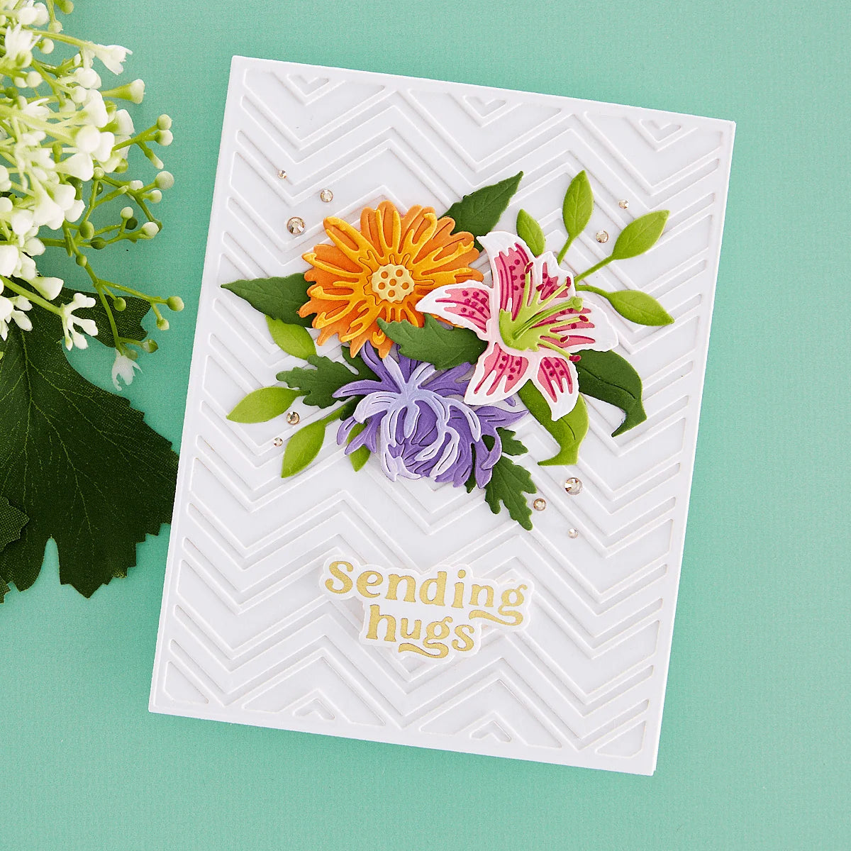 Spellbinders Must-Have Sentiments Press and Foil Plate and Die Set bp-390 bouquet of flowers white zig zag background sending hugs card