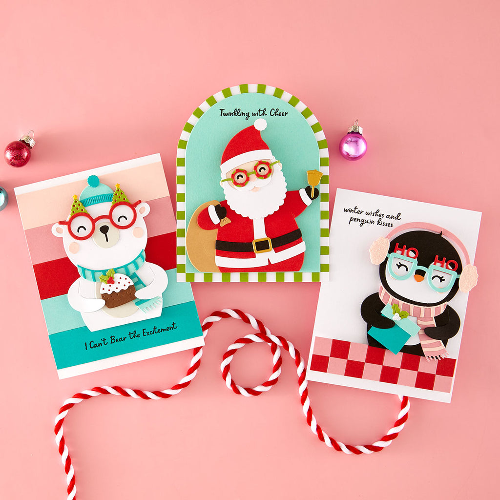 Spellbinders Spectacular Christmas I Want It All Stamp and Die Bundle cards with Santa Claus, Penguin and bear