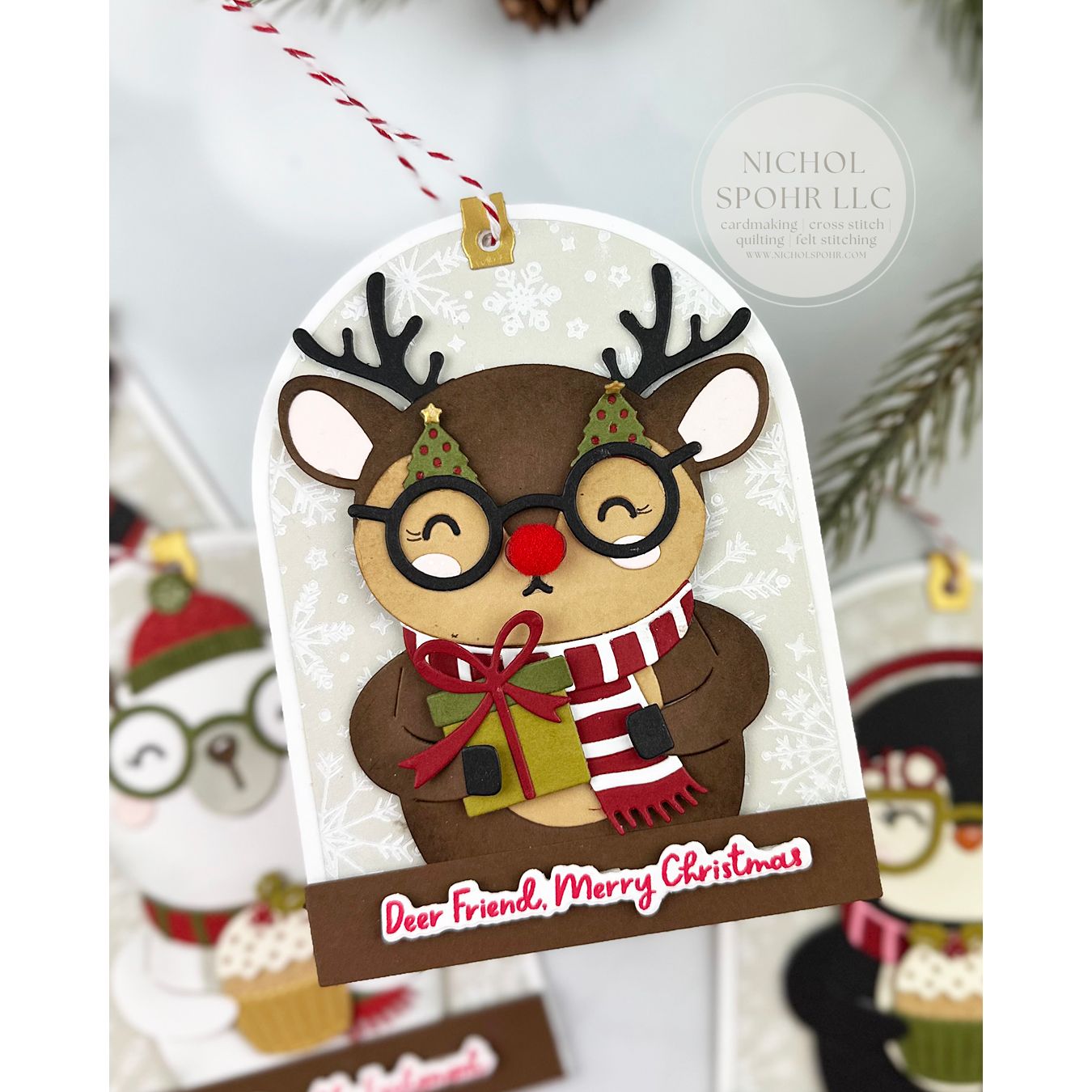 Spellbinders Spectacular Deer Etched Dies s3-564 reindeer with glasses holding present card