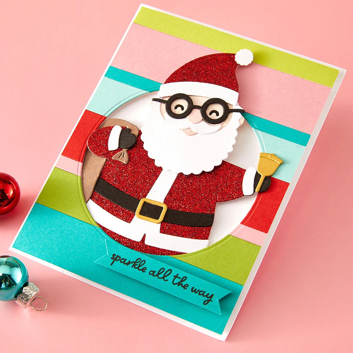 Spellbinders Spectacular Santa Etched Dies s5-723 santa with black glasses striped background sparkle card