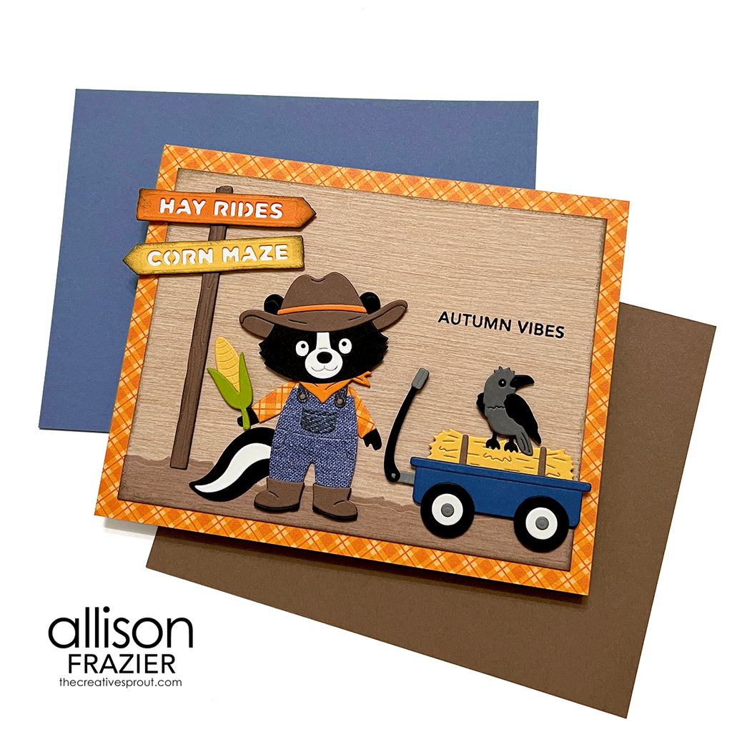 Spellbinders Trailside Trio Etched Dies s4-1503 skunk wearing overalls blue wagon crow autumn vibes card allison frazier