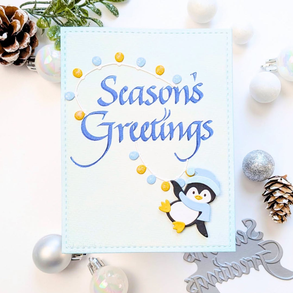 Spellbinders Upright Italic Season's Greetings Press and Foil Plate bp-371 penguin hanging onto lights greetings card