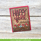Autumn-themed card with 'Happy Fall' text and cartoon mushrooms on a wooden surface.
