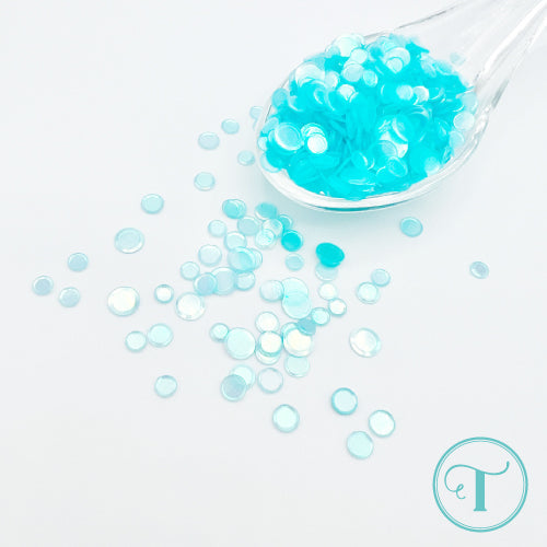 Trinity Stamps Poolside Confetti Embellishment Box tsb-412 close up of flat turquoise blue sequins