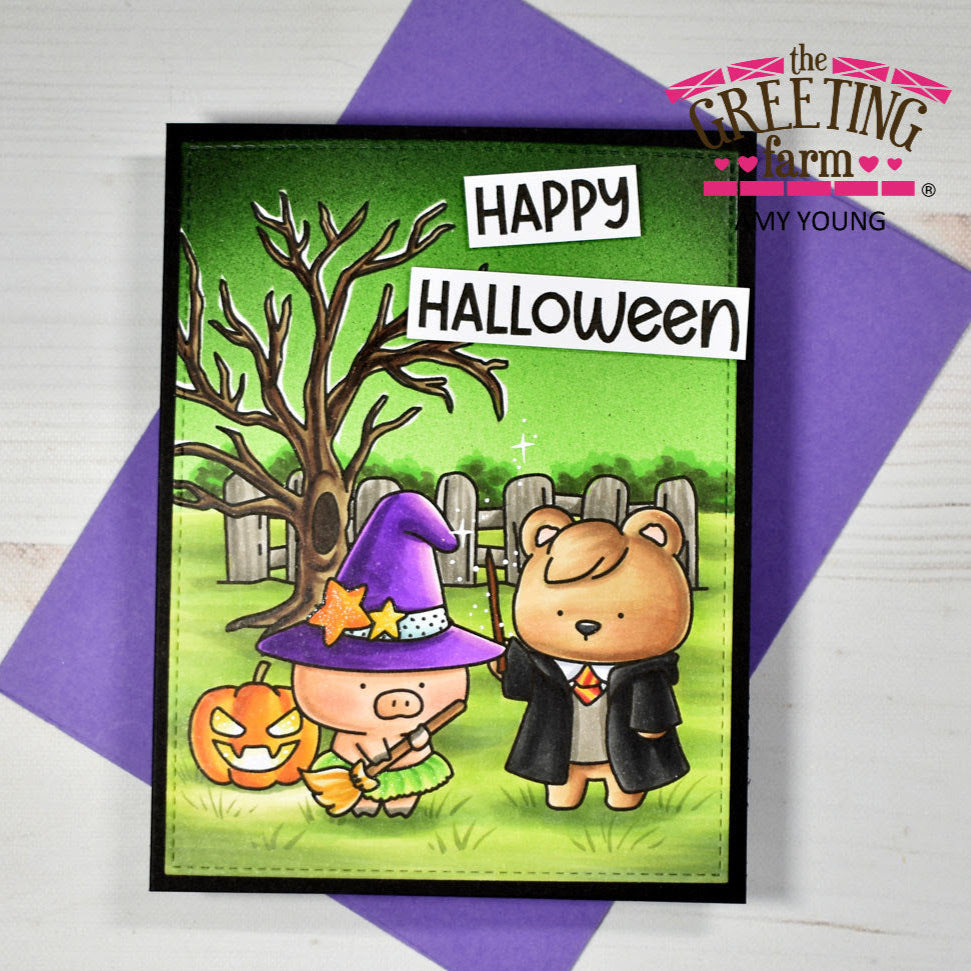 Halloween-themed card with cartoon characters and 'Happy Halloween' text, featuring The Greeting Farm branding.