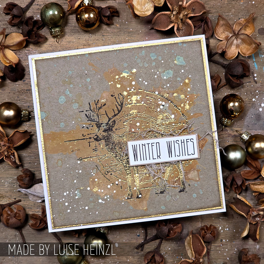 Tim Holtz Christmas 2026 Release I Want It All Cling Stamp and Stencil Bundle gold splatter reindeer winter wishes card luise heinzl