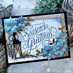 Tim Holtz Sizzix I Want It All 2026 Christmas Die, Folder and Pad Bundle candle lamp season's greetings blue poinsettia black trim card cathie cowles