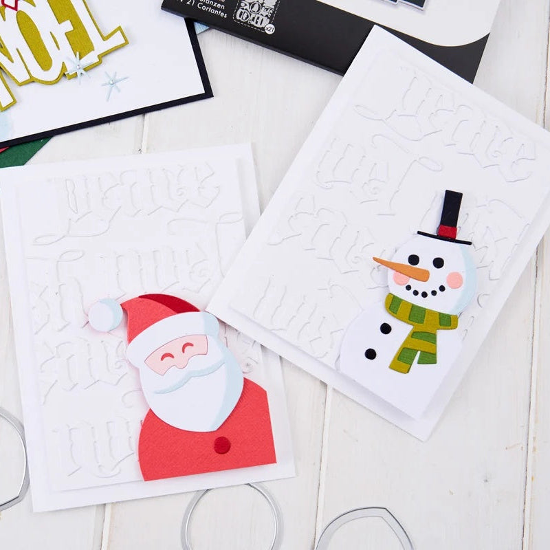 Tim Holtz Sizzix I Want It All 2026 Christmas Die, Folder and Pad Bundle snowman santa clause peace noel cards