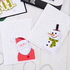Tim Holtz Sizzix I Want It All 2026 Christmas Die, Folder and Pad Bundle snowman santa clause peace noel cards