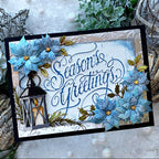 Tim Holtz Sizzix Vault Holly Poinsettia Large A5 Embossing Folder 667252 blue flowers candle lamp seasons' greetings card cathie cowles