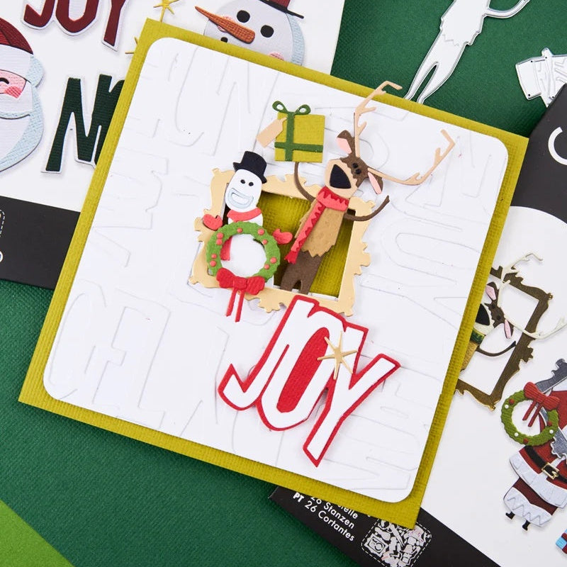 Tim Holtz Sizzix Vault Papercut Christmas Thinlits Dies 667256 snowman reindeer holding present joy card