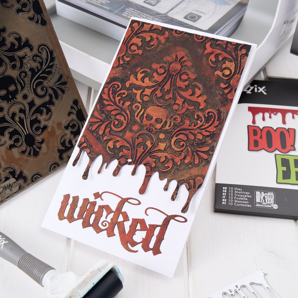 Tim Holtz Sizzix Vault Skull Damask Multi-level Embossing Folder 666912 orange and black design background wicked card