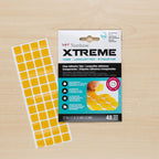 Tombow Xtreme Clear Adhesive Tabs 62134 being applied to project with package detail shown