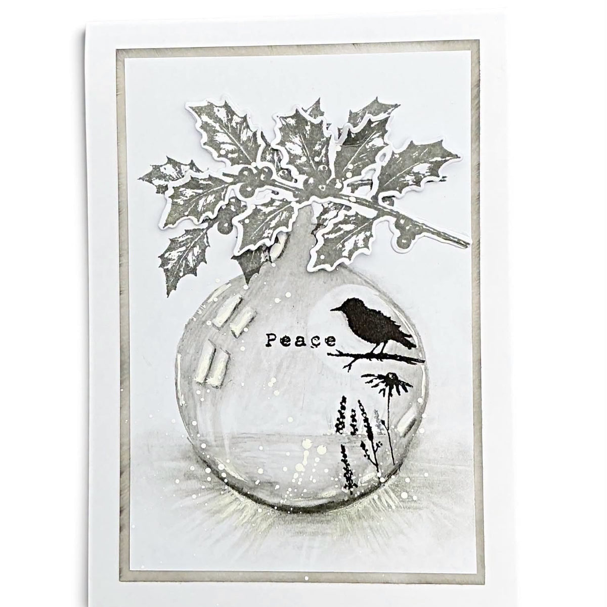 Tracy Evans Boutique Designs Holly Stamp and Die Bundle bauble with the word peace and a bird card