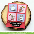 Valentine's Day card with cartoon animals and text on a wooden background