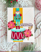 Waffle Flower Nutcracker Dies 422618 red poinsettia flowers blue and red drumsticks christmas card leanne west