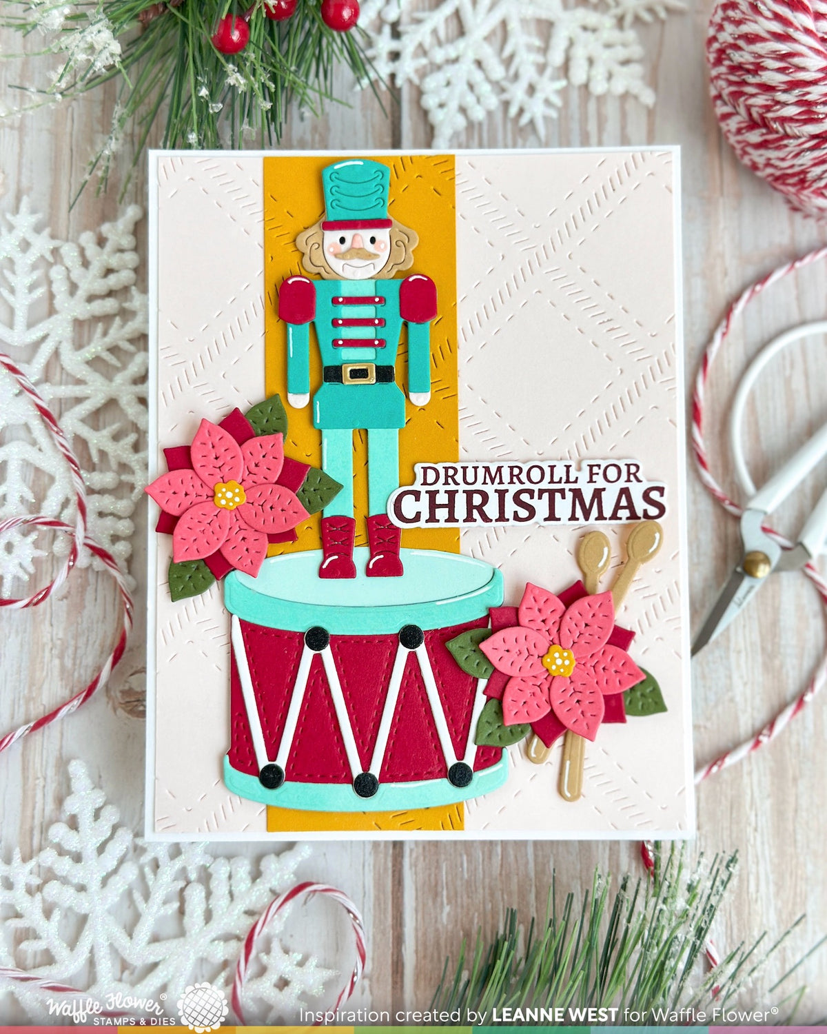 Waffle Flower Nutcracker Dies 422618 red poinsettia flowers blue and red drumsticks christmas card leanne west