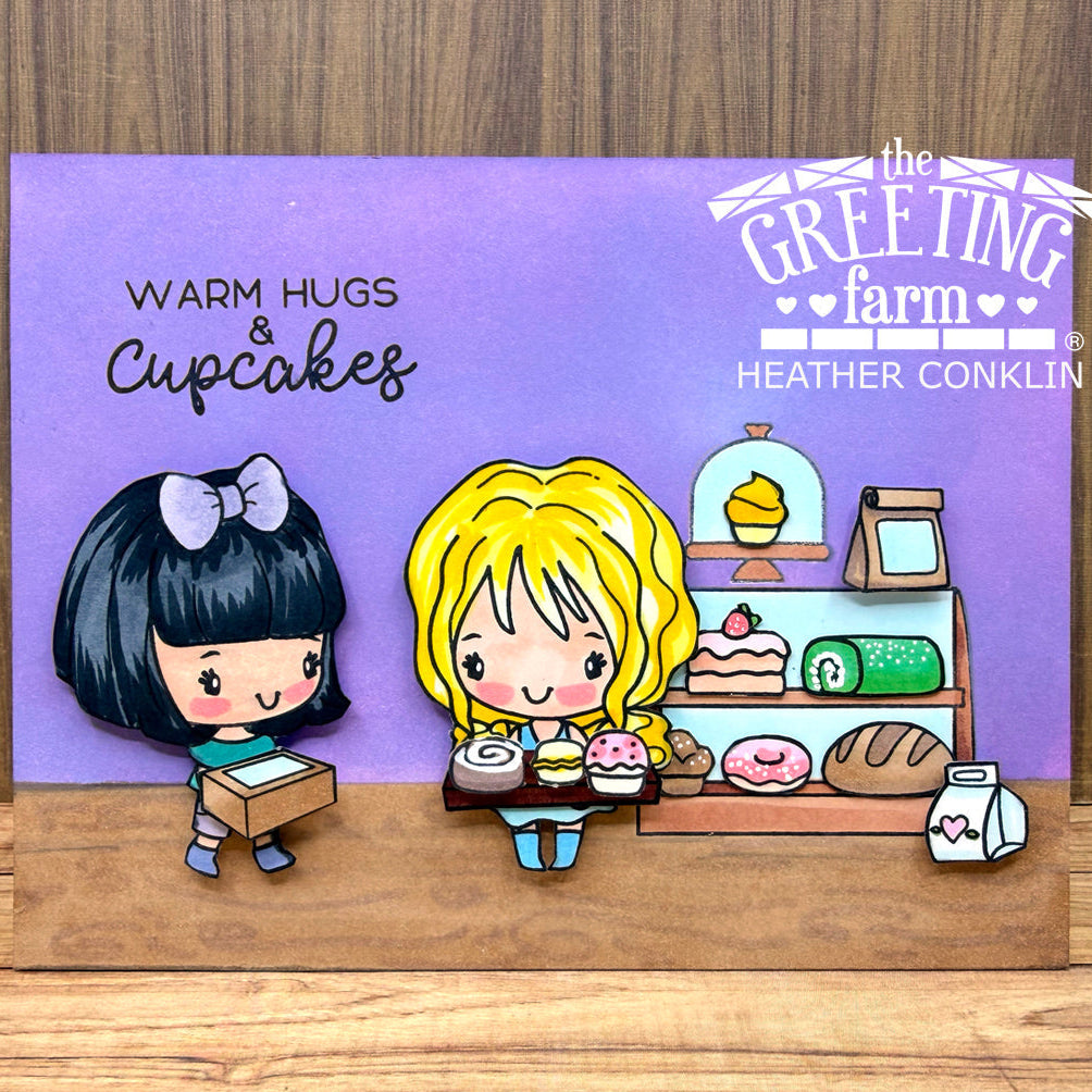 Warm Hugs and Cupcakes Card with Two Friends in Bakery