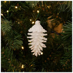 White Glitter Pinecones Ornament Set 5706460 hanging on tree