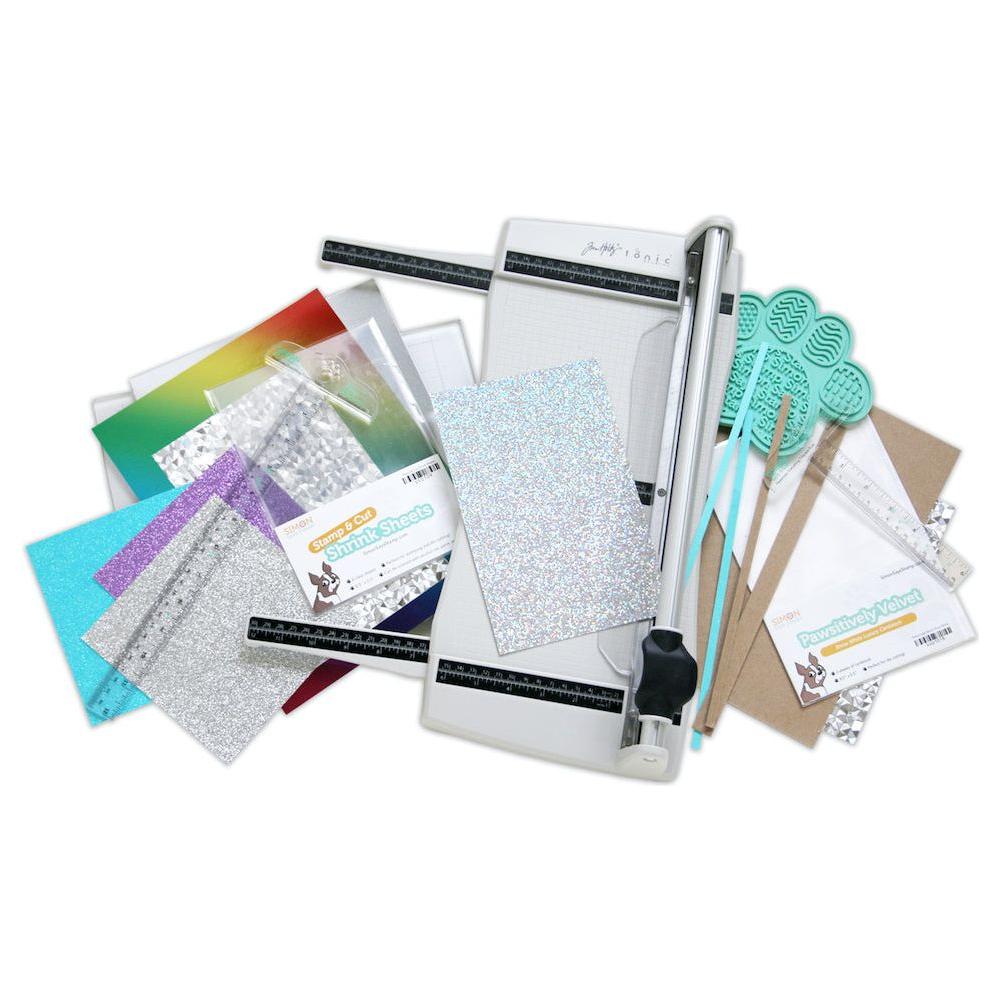 Tim Holtz Tonic Rotary Media Trimmer 3960e glamour shot with Simon Says Stamp products