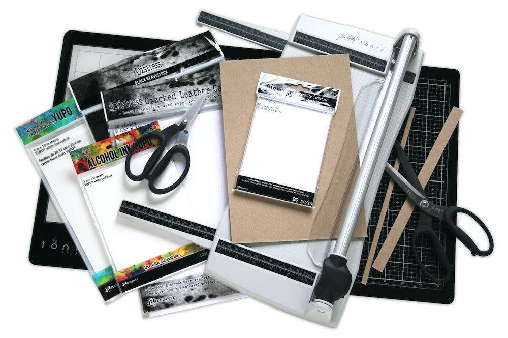 Tim Holtz Tonic Rotary Media Trimmer 3960e Glamour shot with surfaces